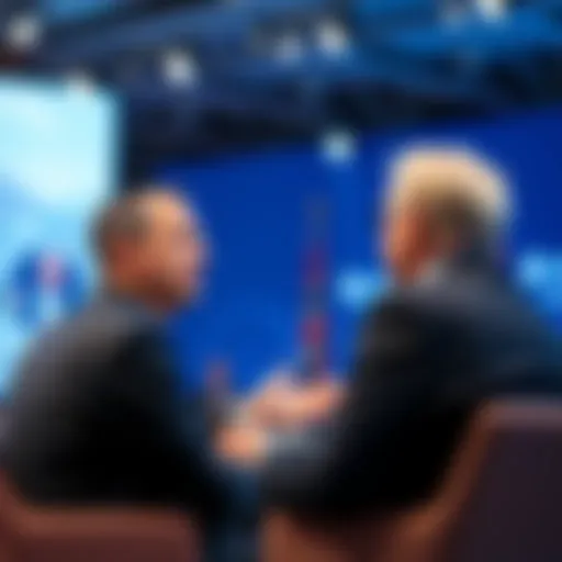 Brian Armstrong speaks to François Villeroy de Galhau during a debate at Davos about Bitcoin and central banking