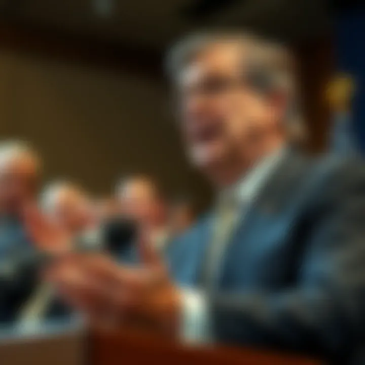 Fed Governor Miran discussing job losses and interest rate cuts at a press conference