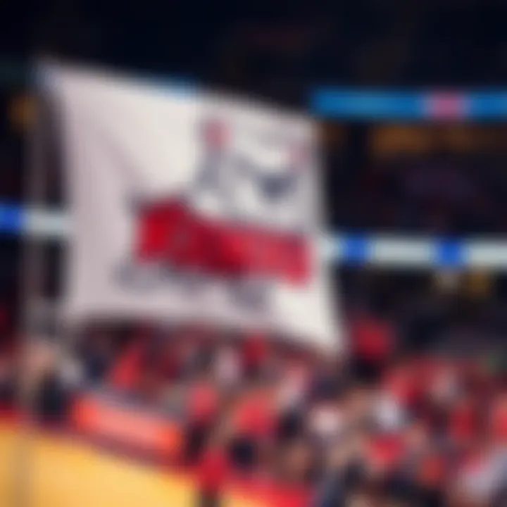 Kendu logo on a banner at the OKC Bulldogs game, with excited fans in the background.