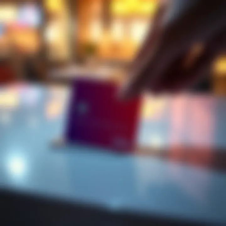 A hand inserting a Revolut card into a random slot on a surface