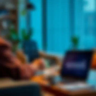 A person discussing the exchange of WeWork passes with a laptop and coffee in a home office setting