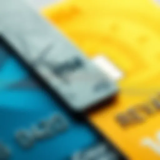A close-up of a scratched Revolut card placed next to a shiny card from a traditional bank, illustrating wear and durability differences.